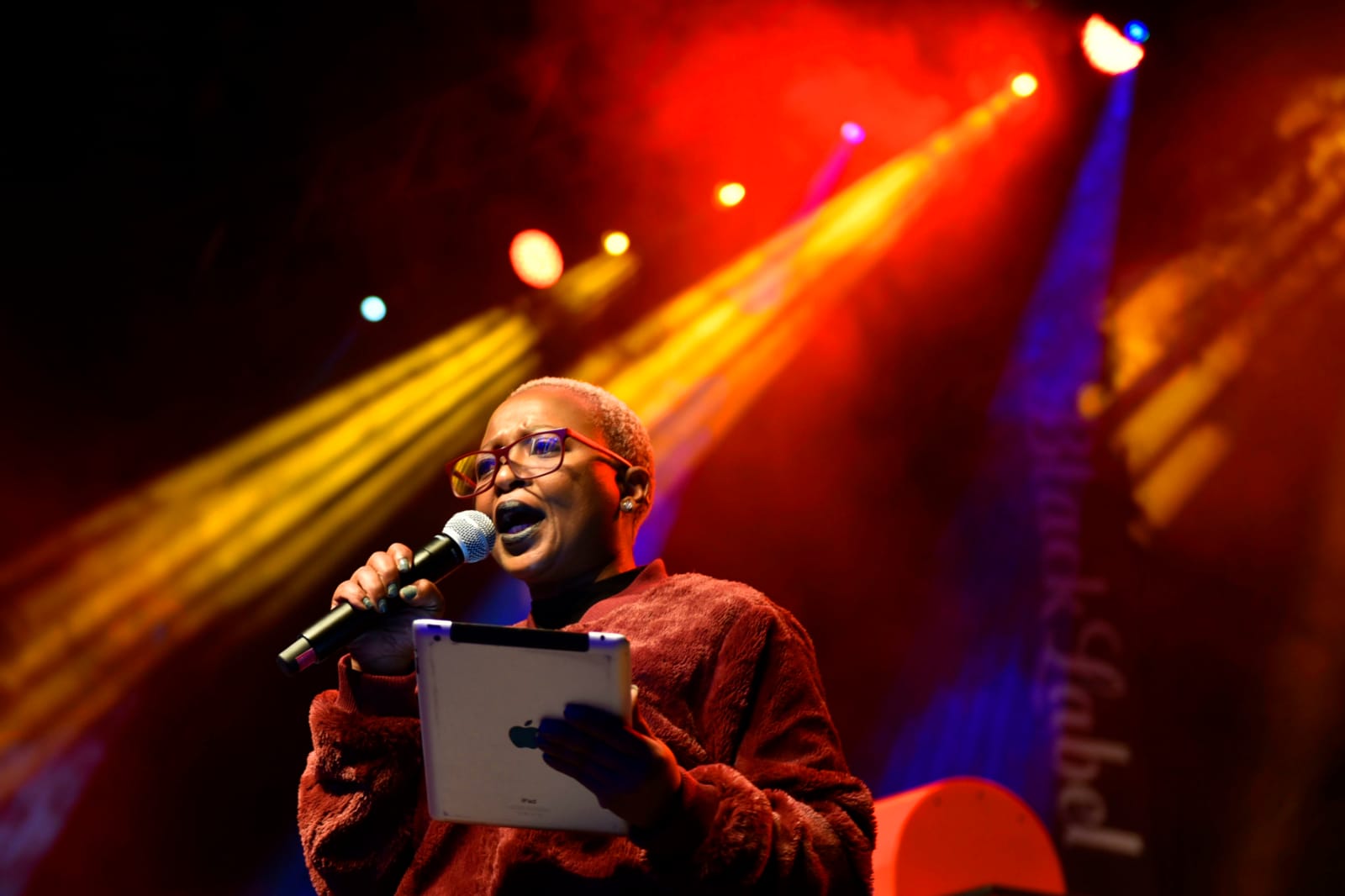 Live event MC on stage Johannesburg — Black Label event photography by Eddie Mtsweni